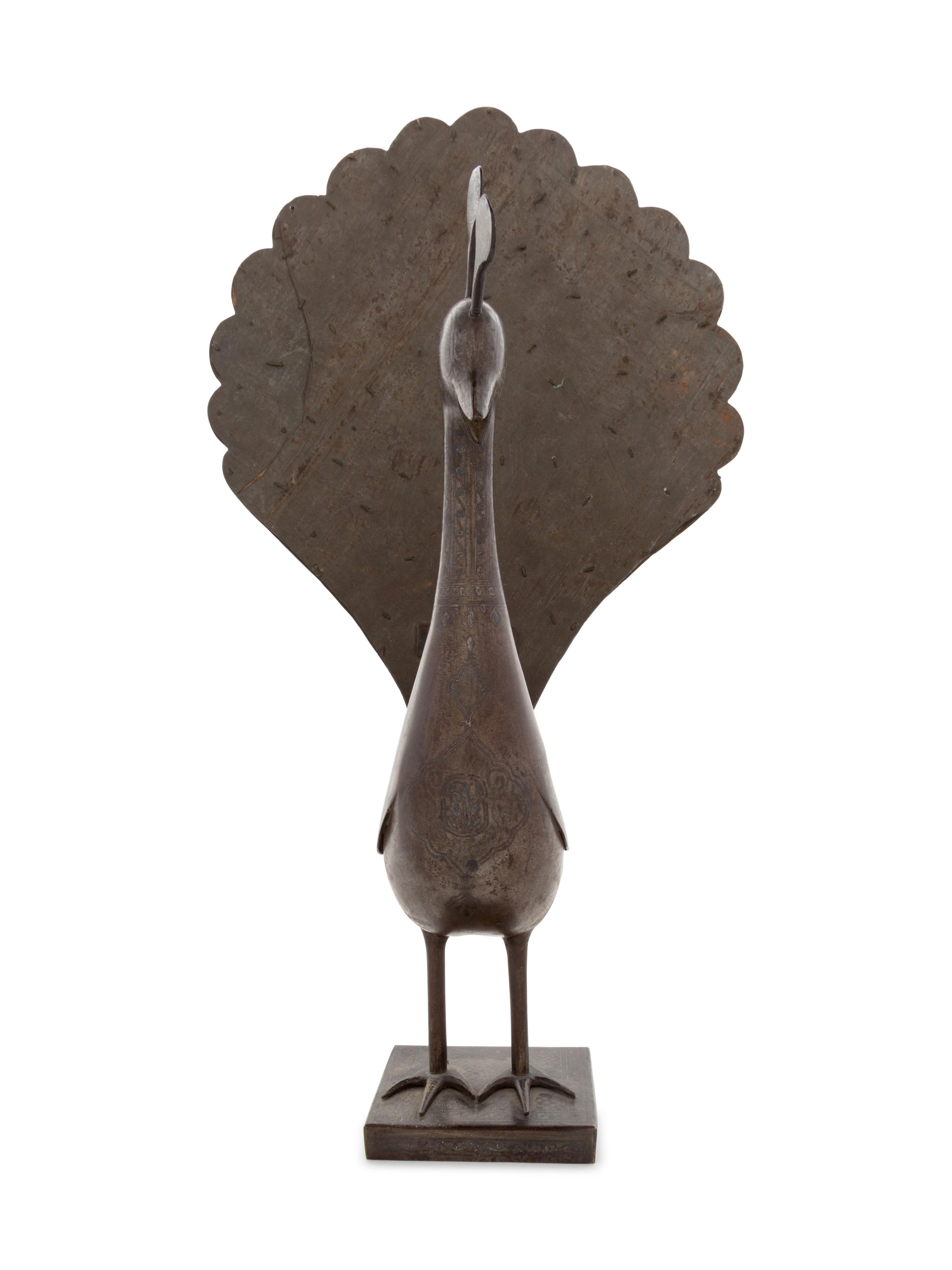 A Qajar Damascened Steel Peacock