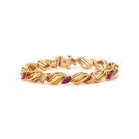 HAMMERMAN BROTHERS, YELLOW GOLD, RUBY, AND DIAMOND BRACELET