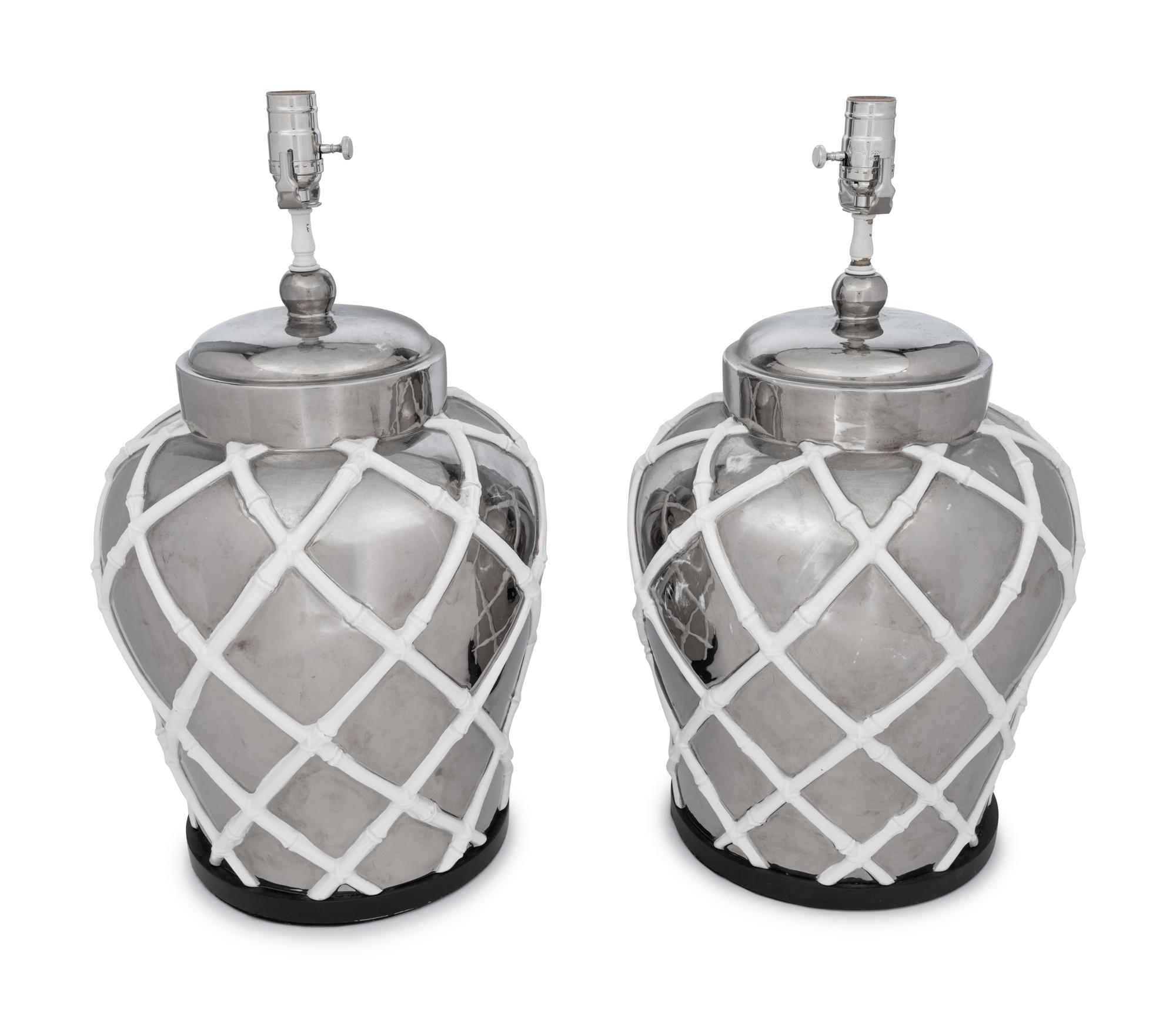 A Pair of Silvered and White Glazed Table Lamps