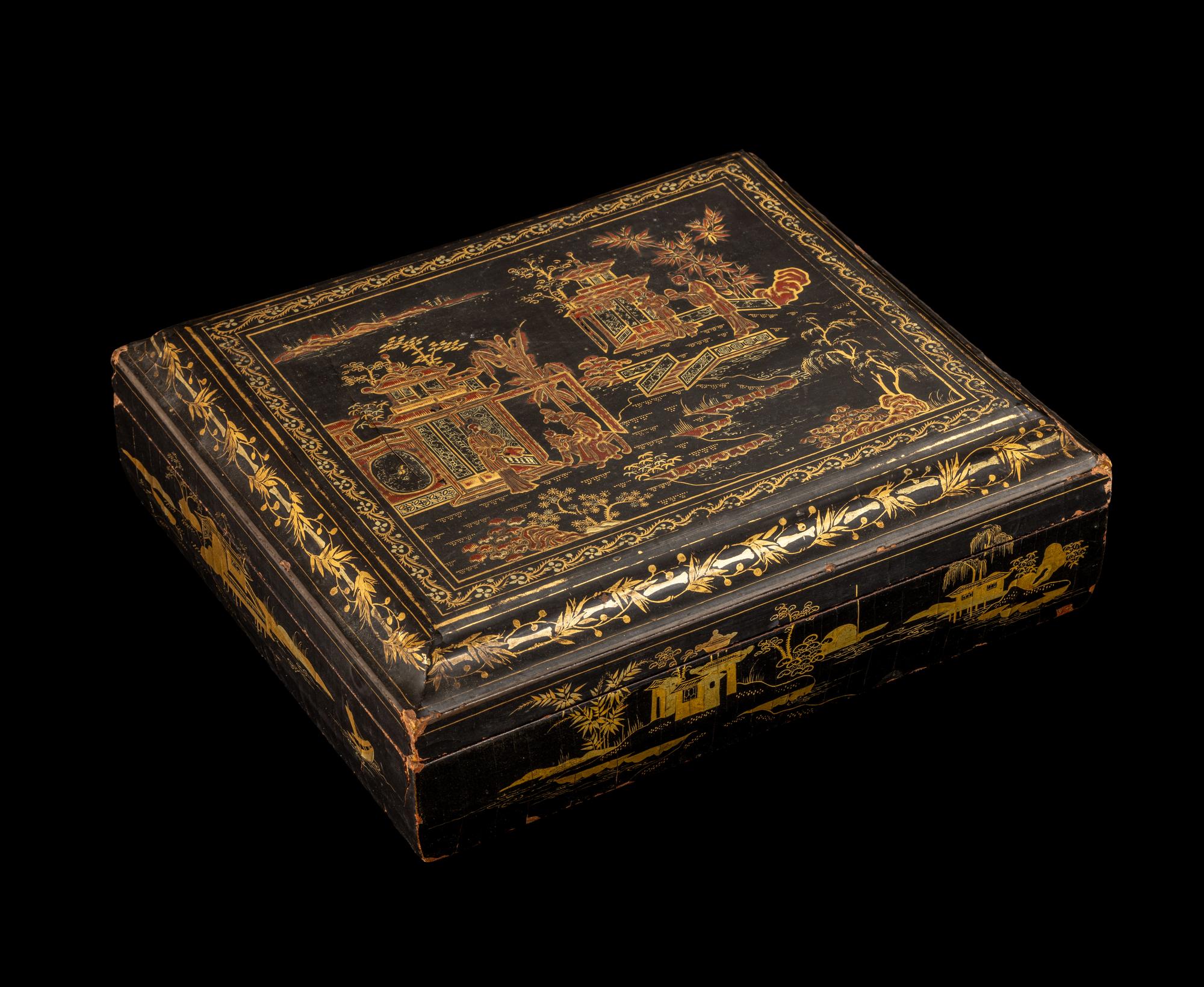 A Chinese Export Gilt and Red Highlighted Black Lacquered Box and Cover