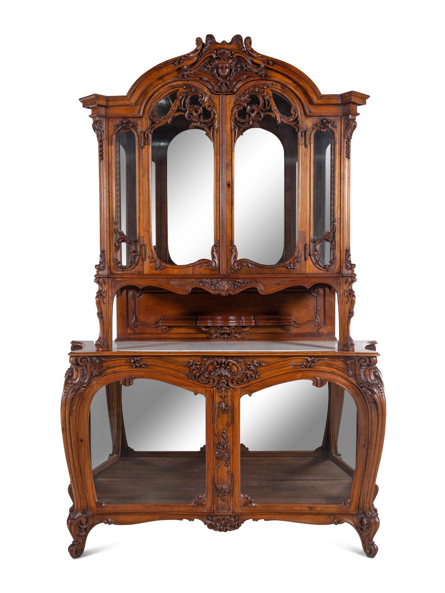 A Louis XV Style Carved Walnut Buffet à Deux Corps