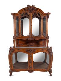 A Louis XV Style Carved Walnut Buffet à Deux Corps