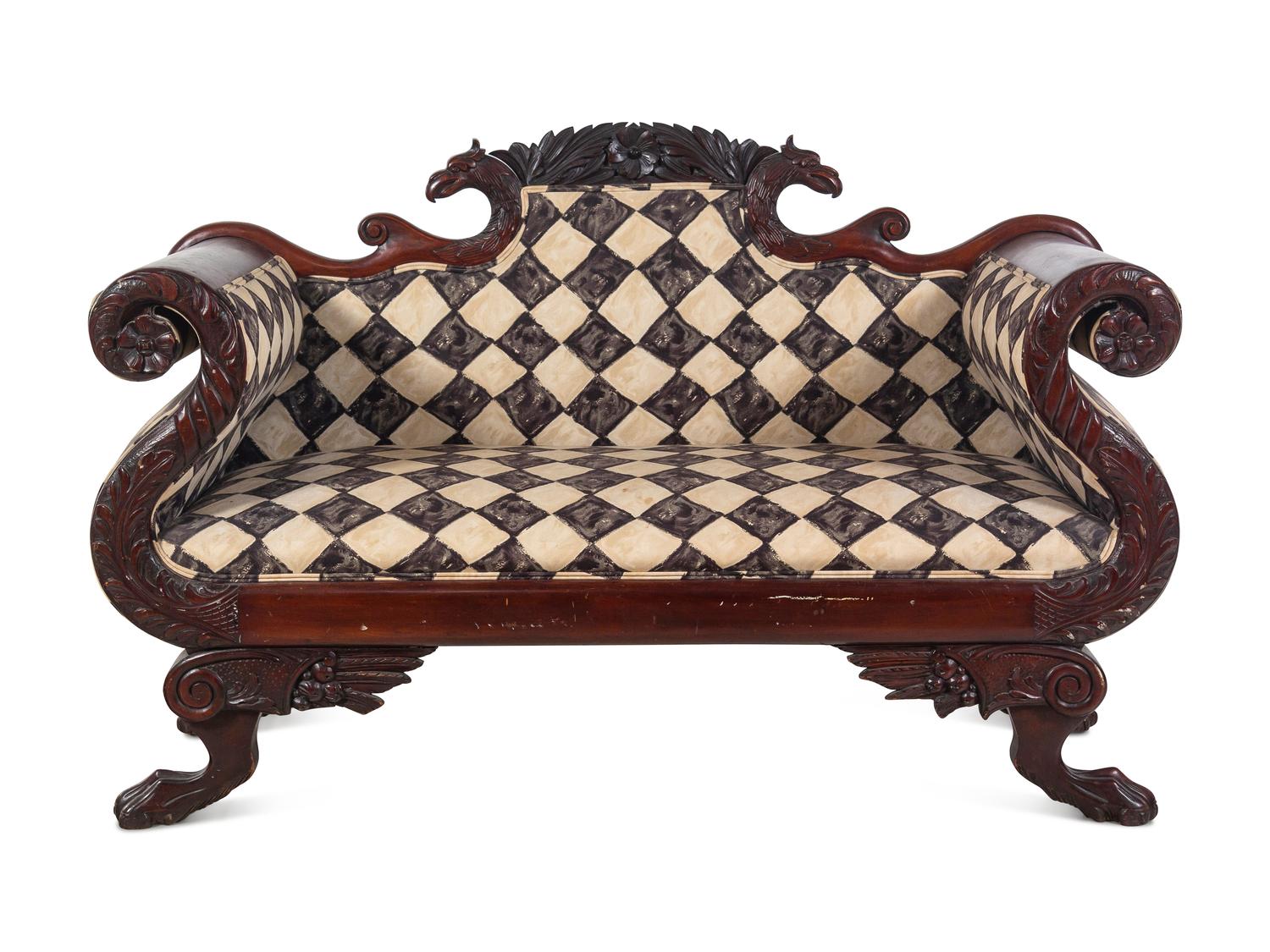 A Classical Carved and Figured Mahogany Settee