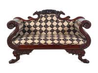A Classical Carved and Figured Mahogany Settee