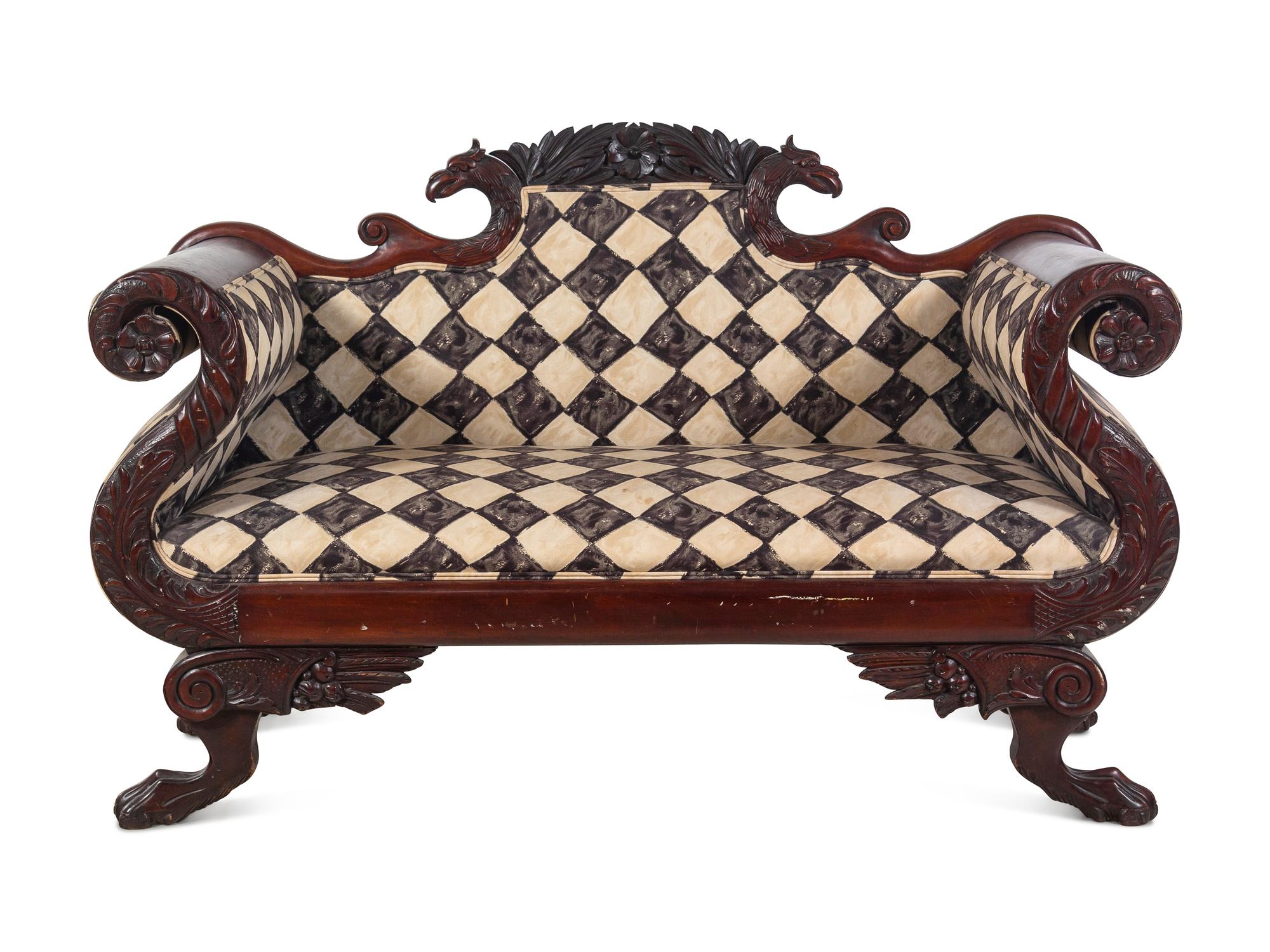 A Classical Carved and Figured Mahogany Settee