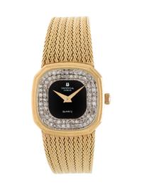 UNIVERSAL GENEVE, 14K YELLOW GOLD AND DIAMOND WRISTWATCH