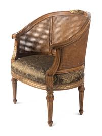 A Pair of Louis XVI Style Caned Bergères