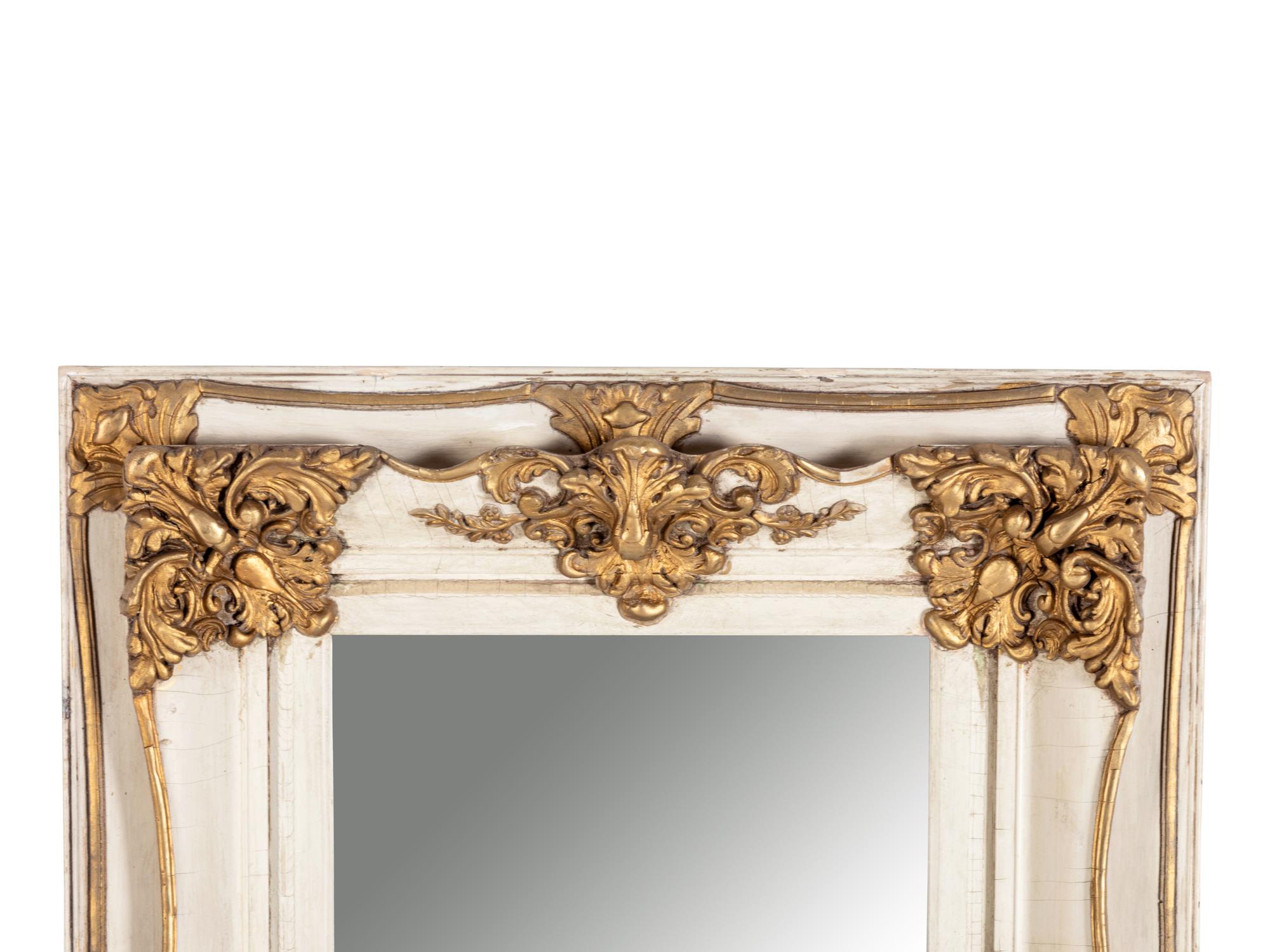 A Contemporary Painted and Parcel Gilt Mirror
