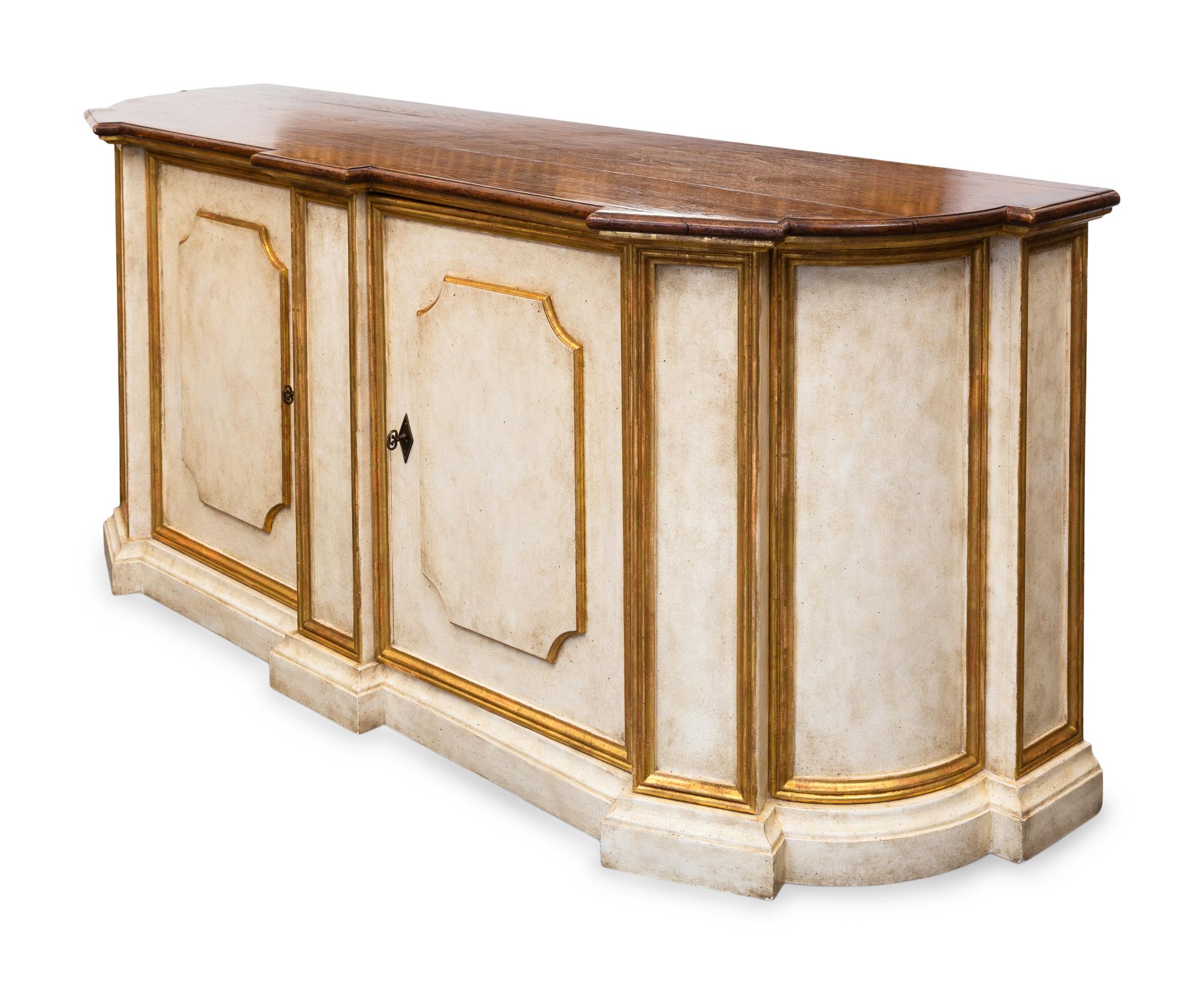 A Painted and Parcel Gilt Sideboard