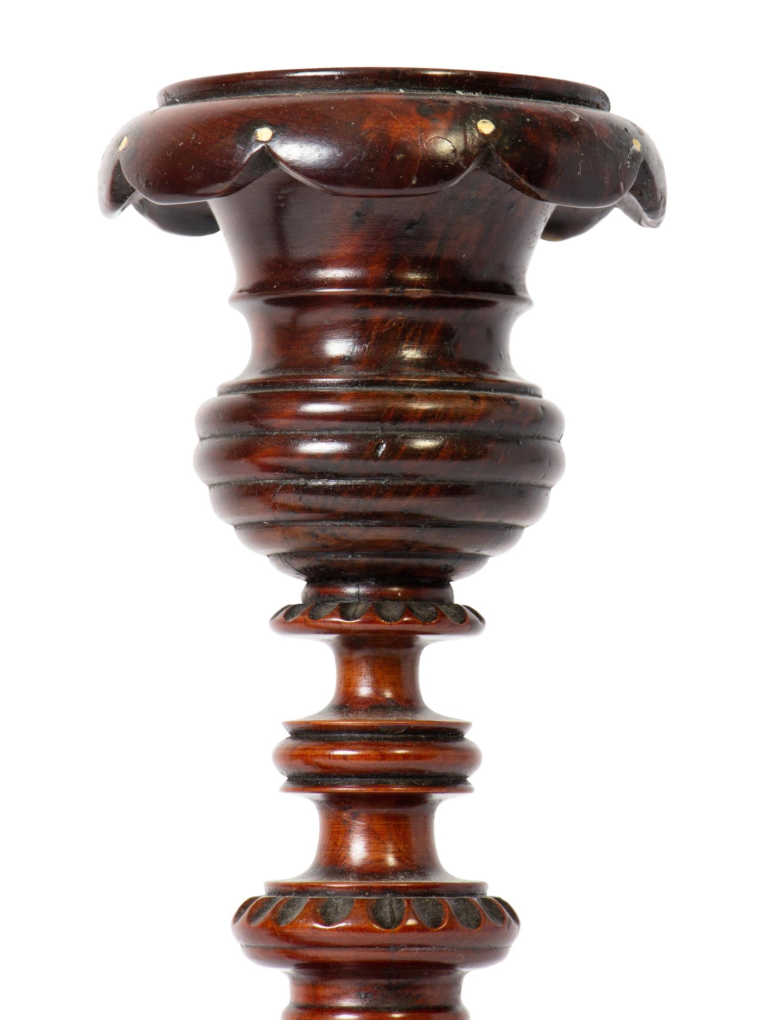 A Pair of Continental Wooden Candlesticks