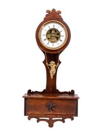 A Continental Oak Cased Wall Clock