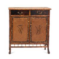 A Victorian Aesthetic Movement Burnt Bamboo Side Cabinet