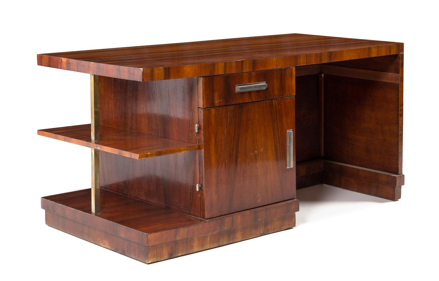 An Art Deco Mahogany, Glass, and Chromed Metal Desk Height 29 1/2 x width 59 x depth 29 1/2 inches