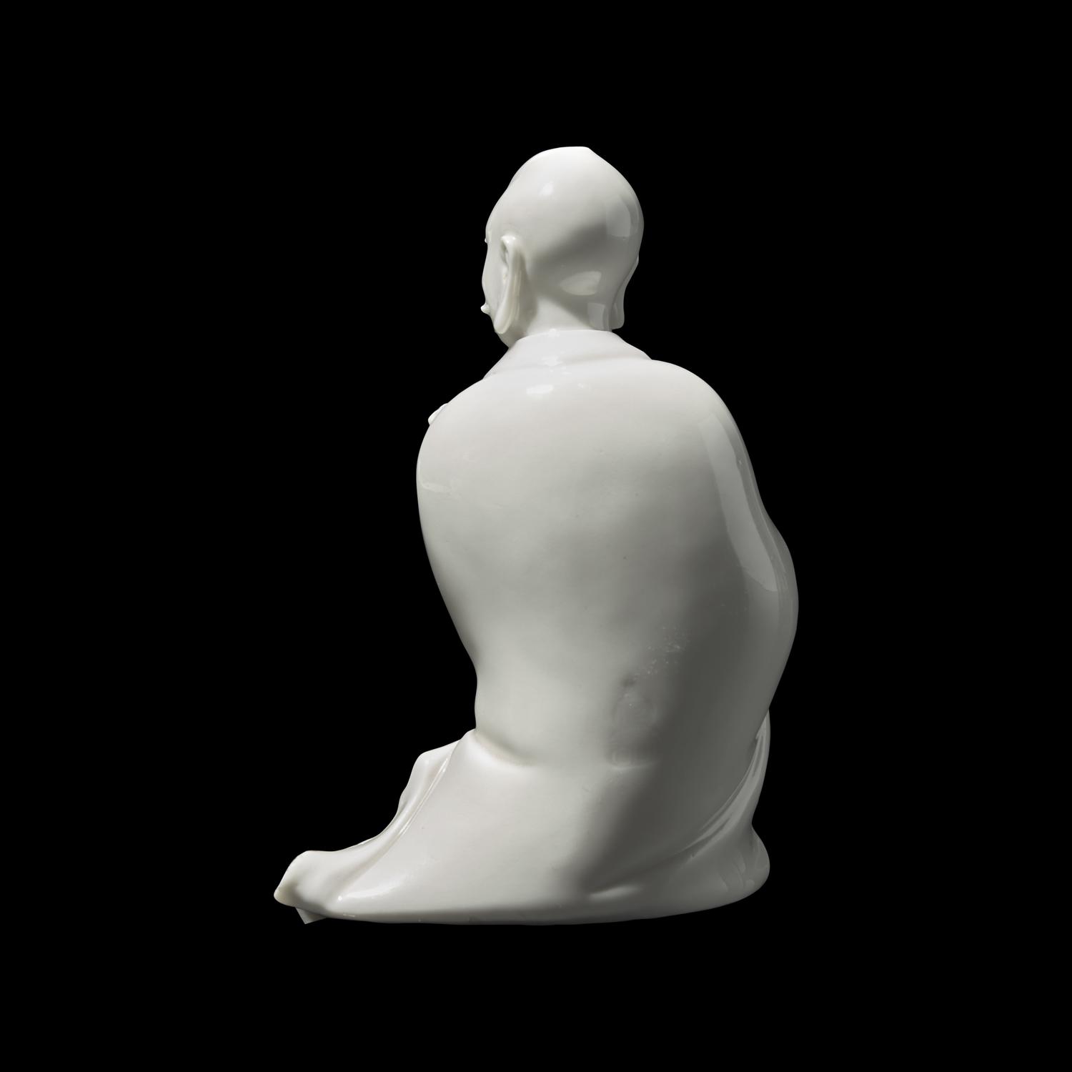 A Chinese Blanc de Chine Figure of Bodhidharma, Possibly 18th/19th Century 或爲清中期 德化白瓷達摩坐像