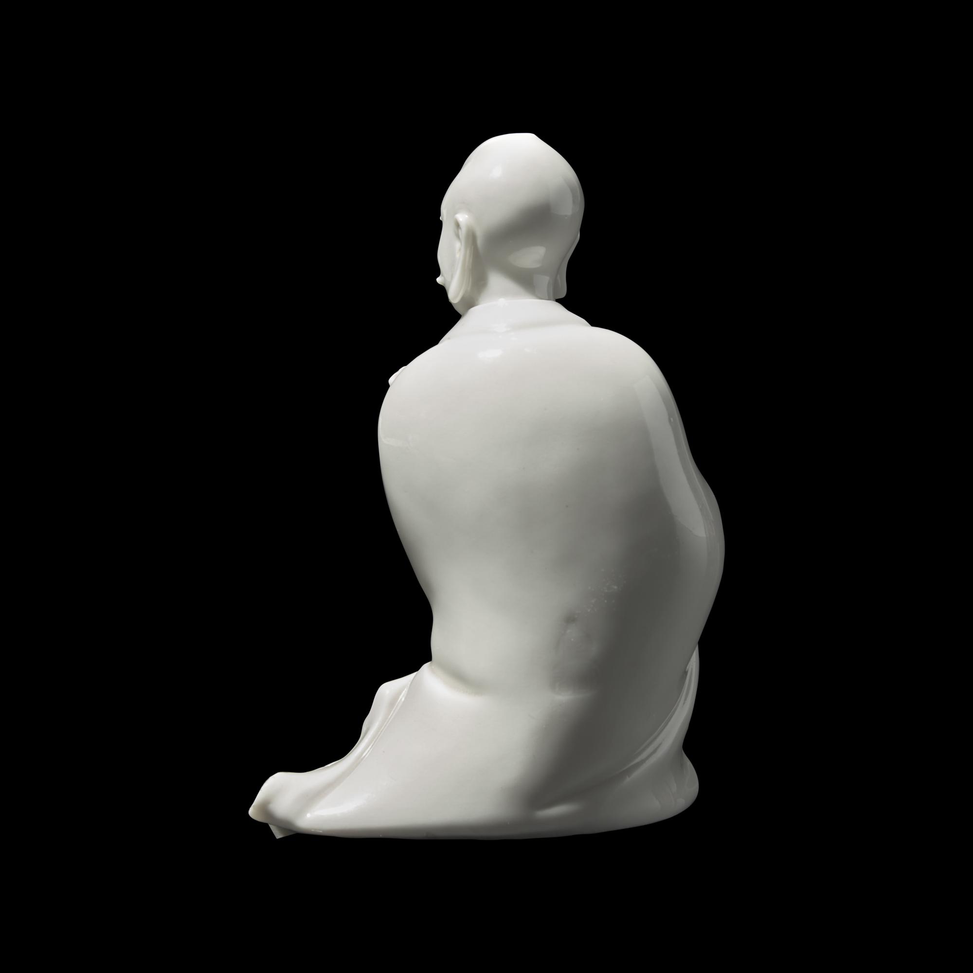 A Chinese Blanc de Chine Figure of Bodhidharma, Possibly 18th/19th Century 或爲清中期 德化白瓷達摩坐像