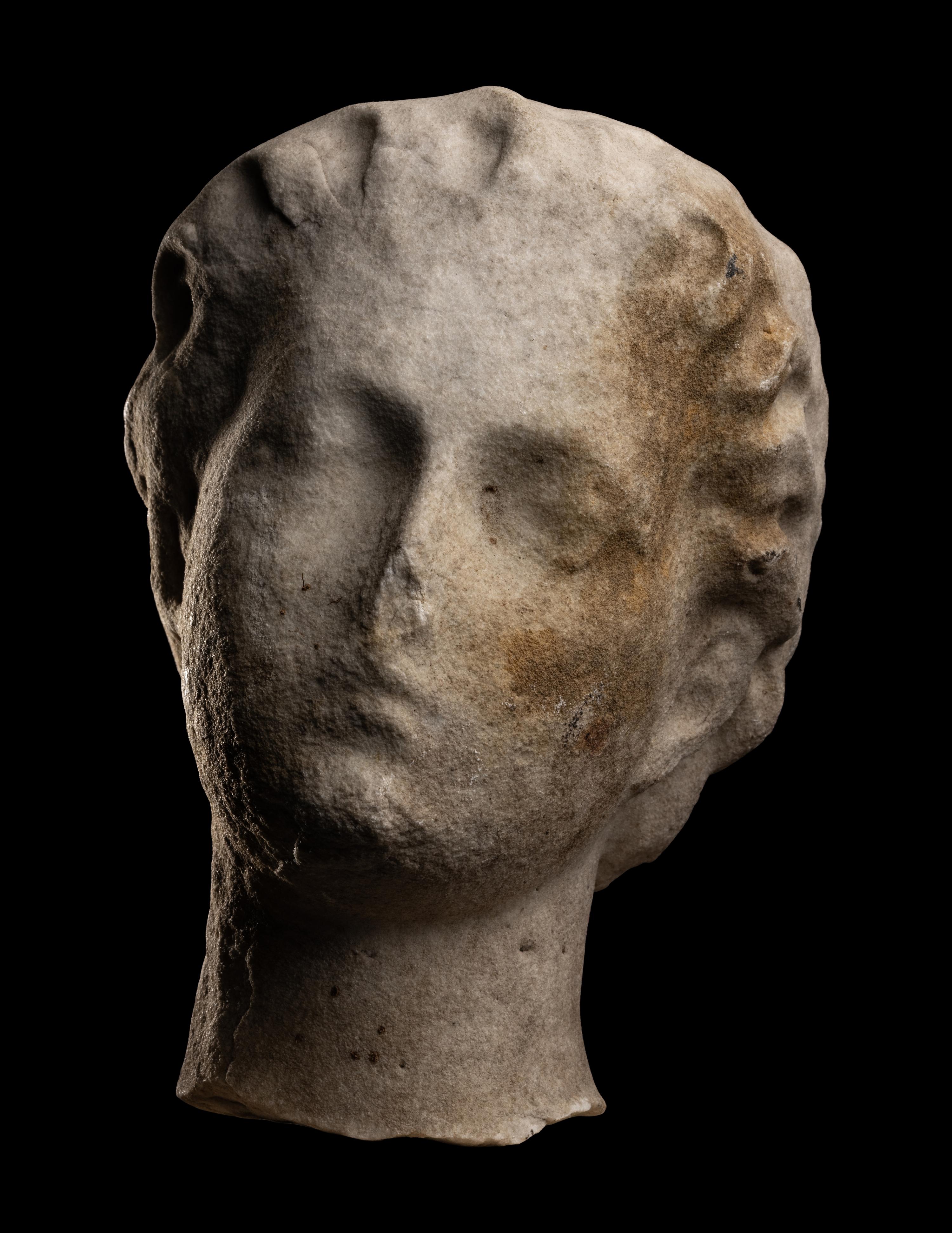 A Roman Marble Head of a Woman