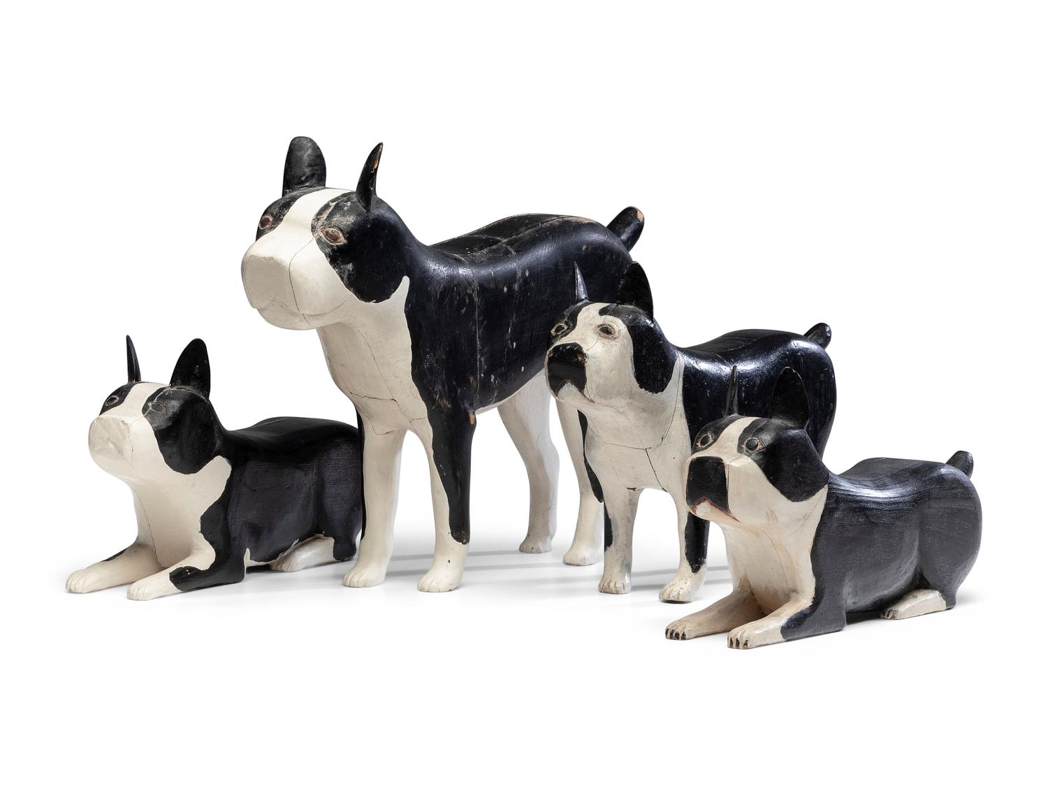 A Set of Four Carved and Painted Wood Boston Terrier Figures
