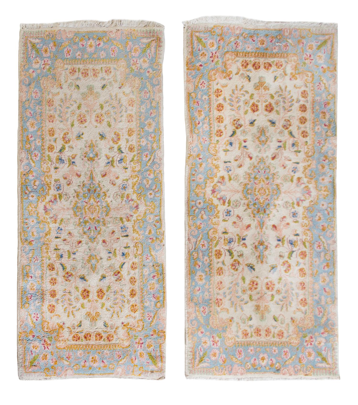 A Pair of Kirman Wool Rugs 4 feet 2 inches x 1 foot 11 inches.