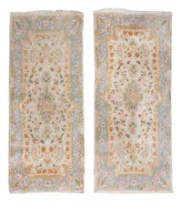 A Pair of Kirman Wool Rugs 4 feet 2 inches x 1 foot 11 inches.