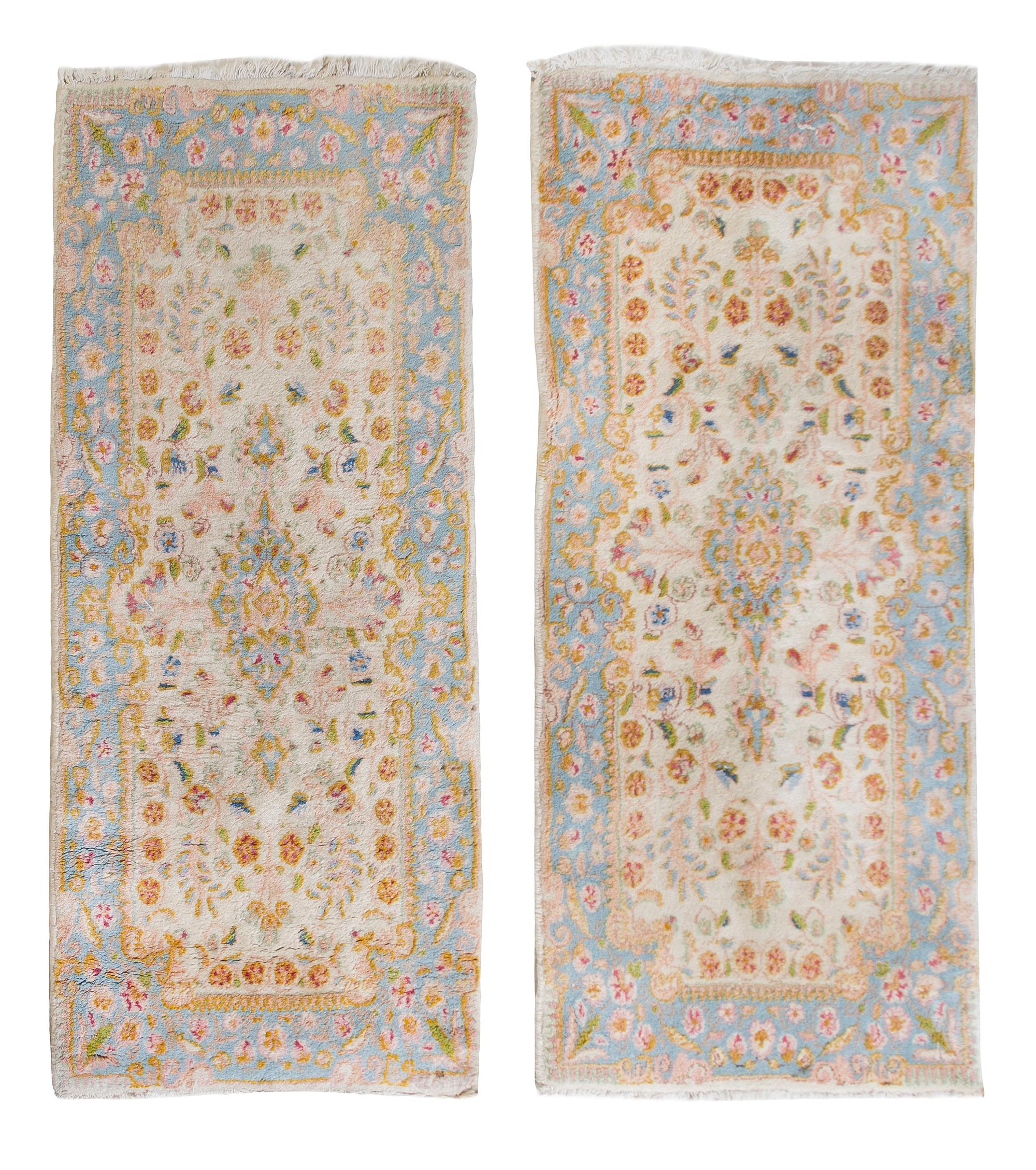 A Pair of Kirman Wool Rugs 4 feet 2 inches x 1 foot 11 inches.