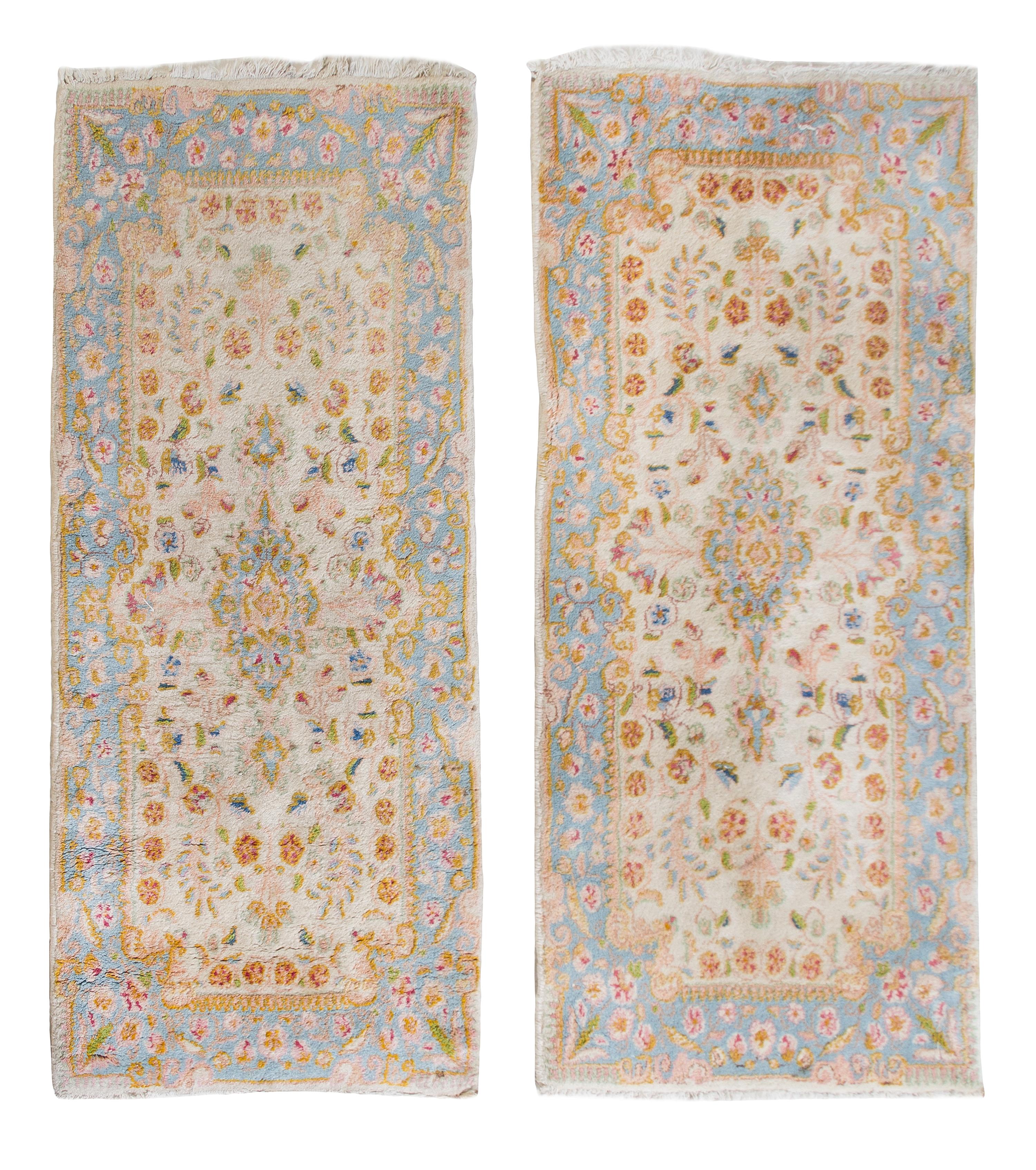 A Pair of Kirman Wool Rugs 4 feet 2 inches x 1 foot 11 inches.