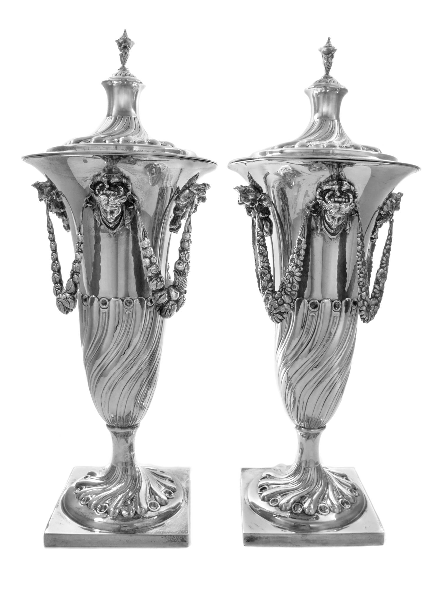 A Matched Pair of English Silver-Plate Covered Urns, Likely Henry Wilkinson & Co., Sheffield, 19th Century, each cover surmounted by an