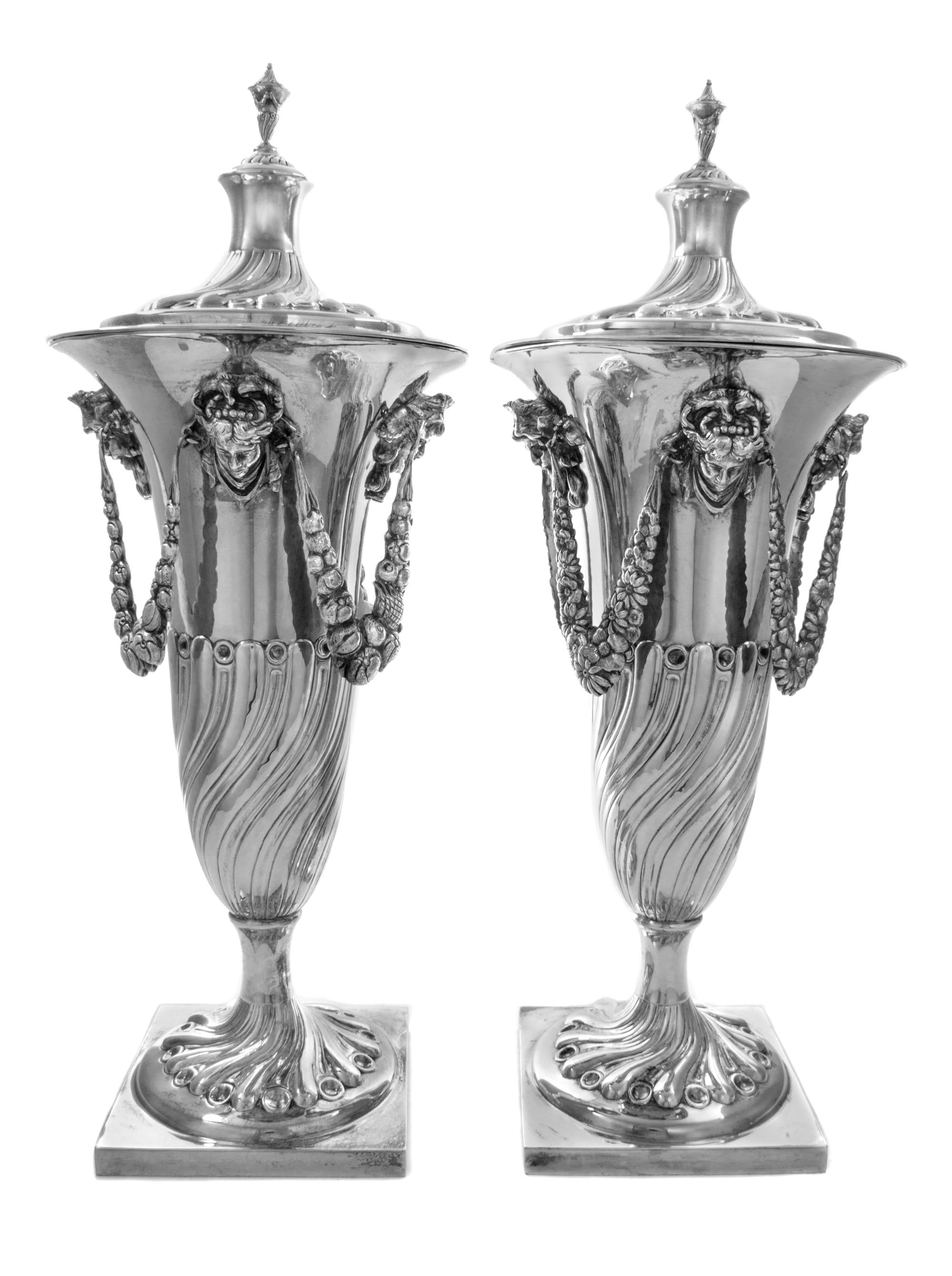 A Matched Pair of English Silver-Plate Covered Urns, Likely Henry Wilkinson & Co., Sheffield, 19th Century, each cover surmounted by an