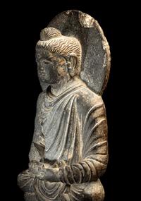 A Gandharan Grey Schist Figure of Seated Buddha