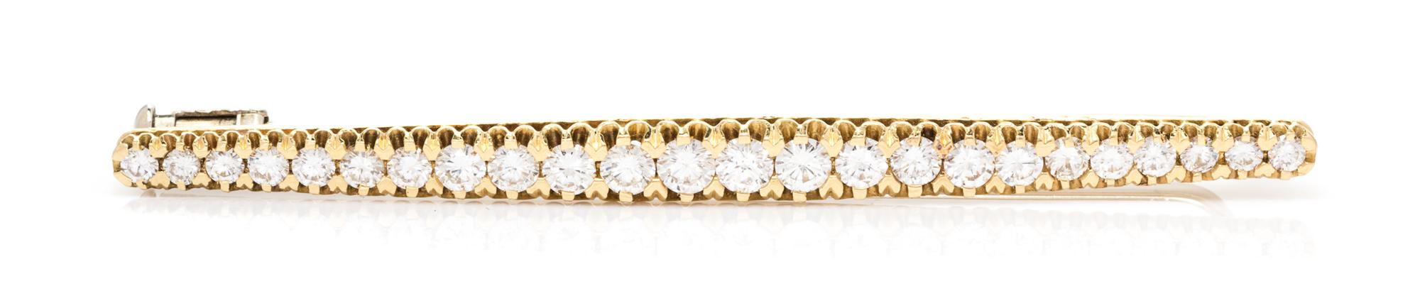 An 18 Karat Yellow Gold and Diamond Bar Brooch, 3.50 dwts.