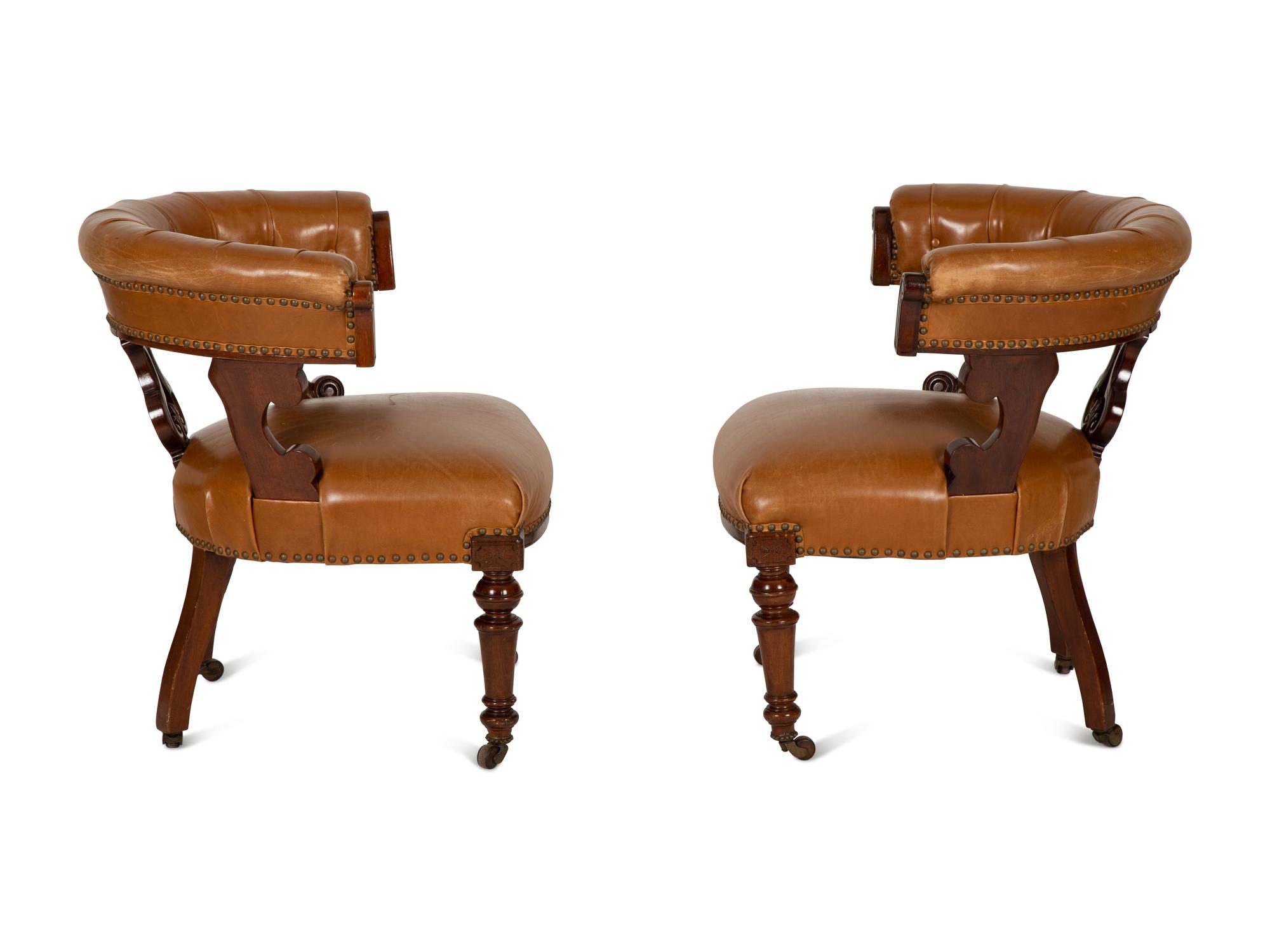 A Pair of William IV Style Leather-Upholstered Mahogany Armchairs