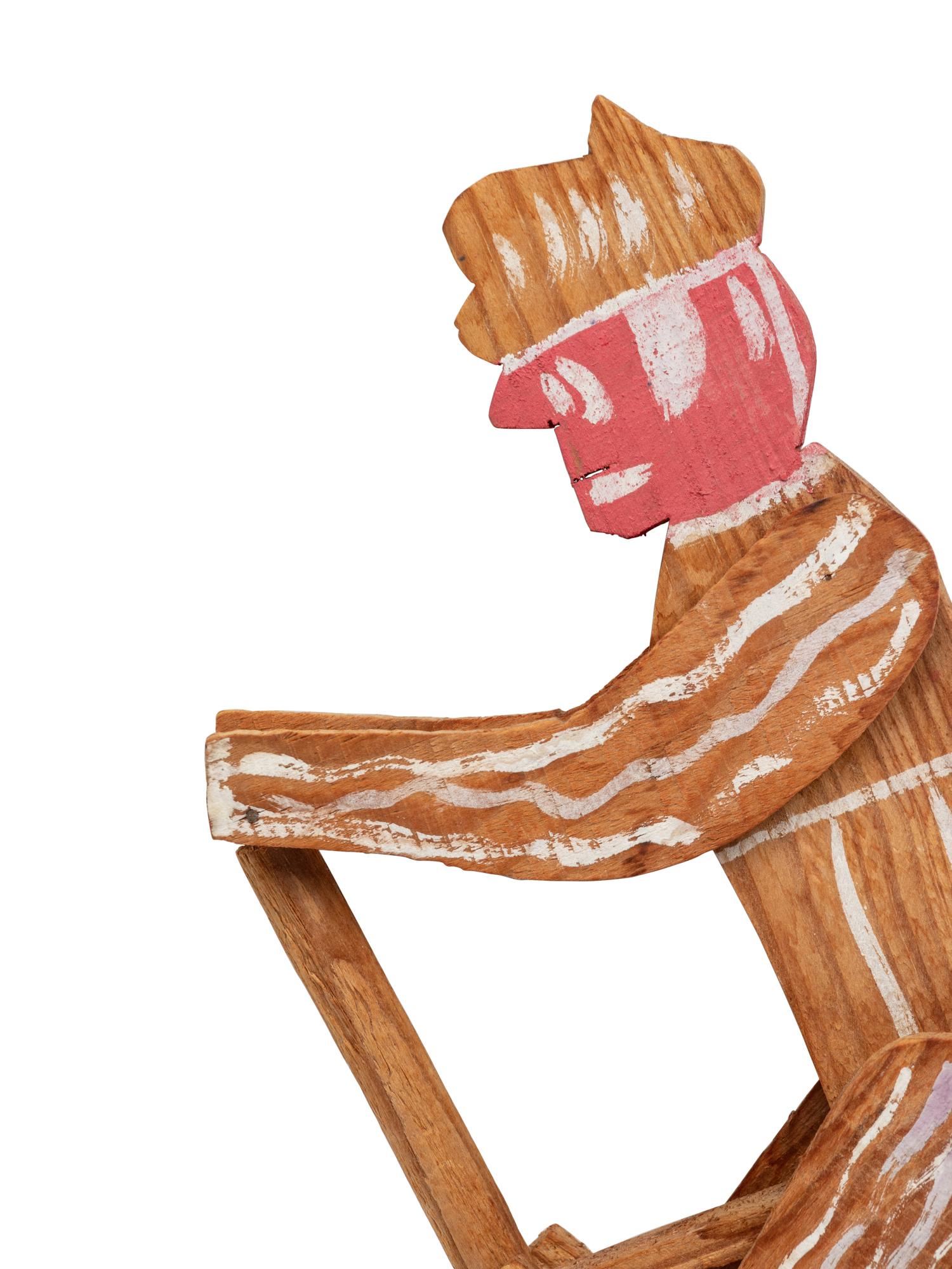 A Child’s Carved and Painted Wood Unicycle Push Toy
