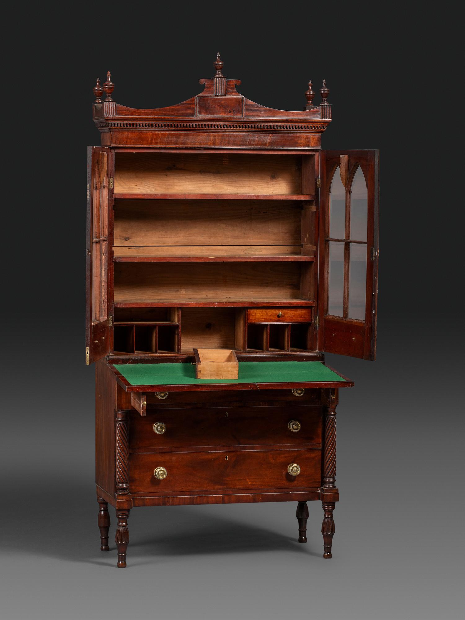 A Federal Carved and Figured Mahogany Lady's Writing Desk