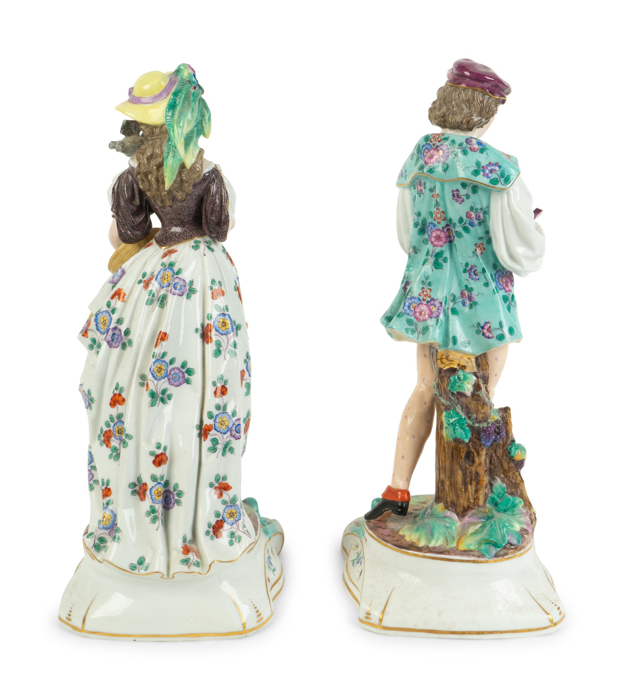 A Pair of Continental Porcelain Figures — 20TH CENTURY