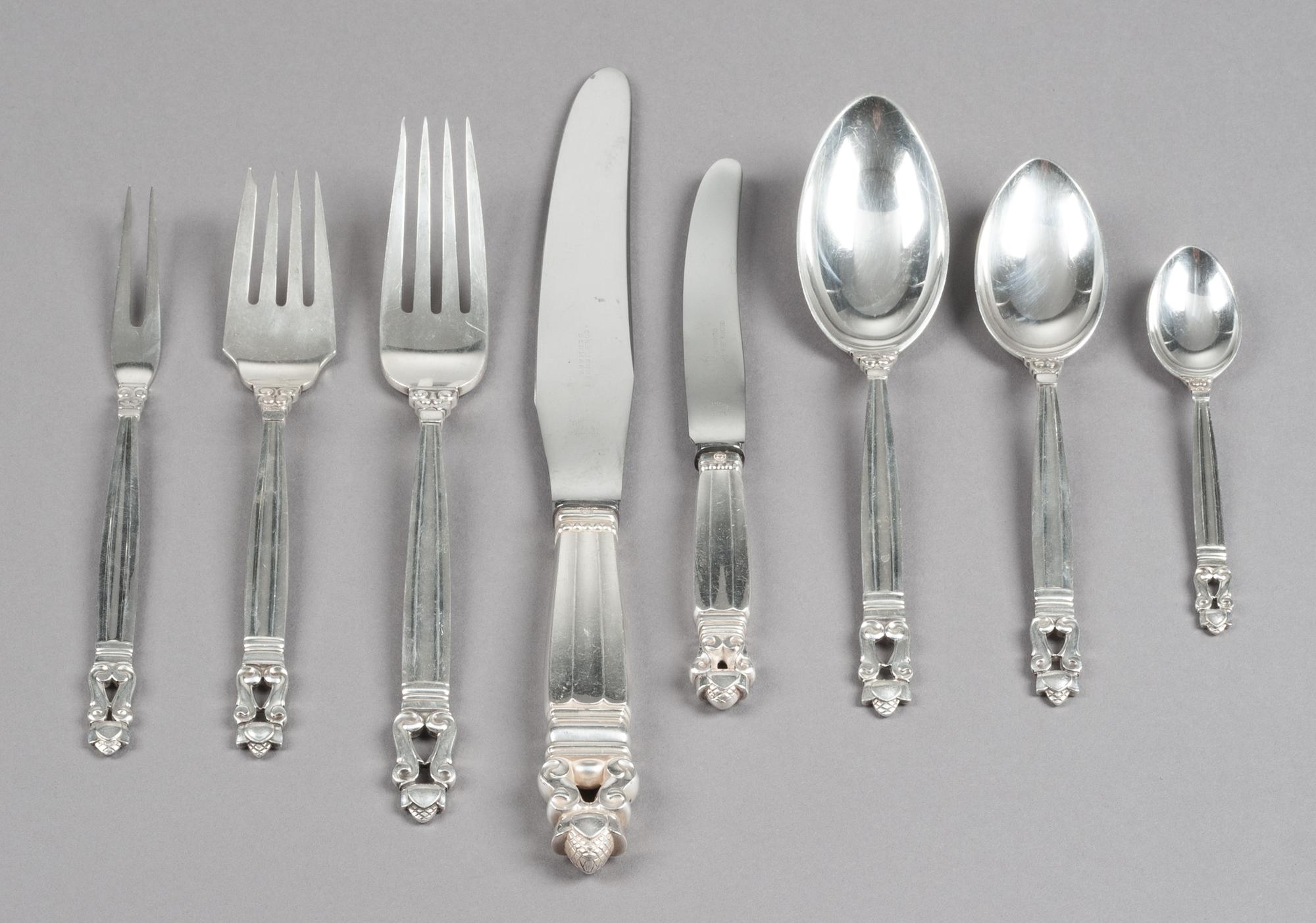A Danish Silver Flatware Service, Georg Jensen Silversmithy, Copenhagen, 20th Century, Acorn pattern, comprising: 12 dinner knives 12 d