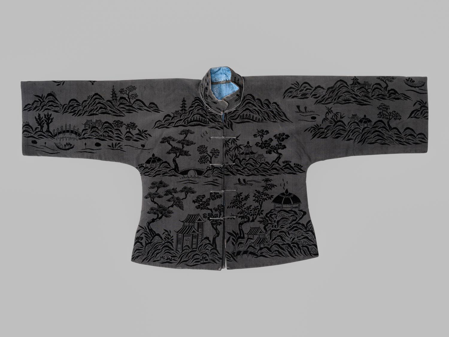 A Chinese Black Ground Silk Twill and Cut Velvet Jacket