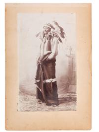 [NATIVE AMERICANS]. [ANDERSON, John A., photographer (1869-1948)]. Two photographs of Sioux Indians, incl. Two Strikes.