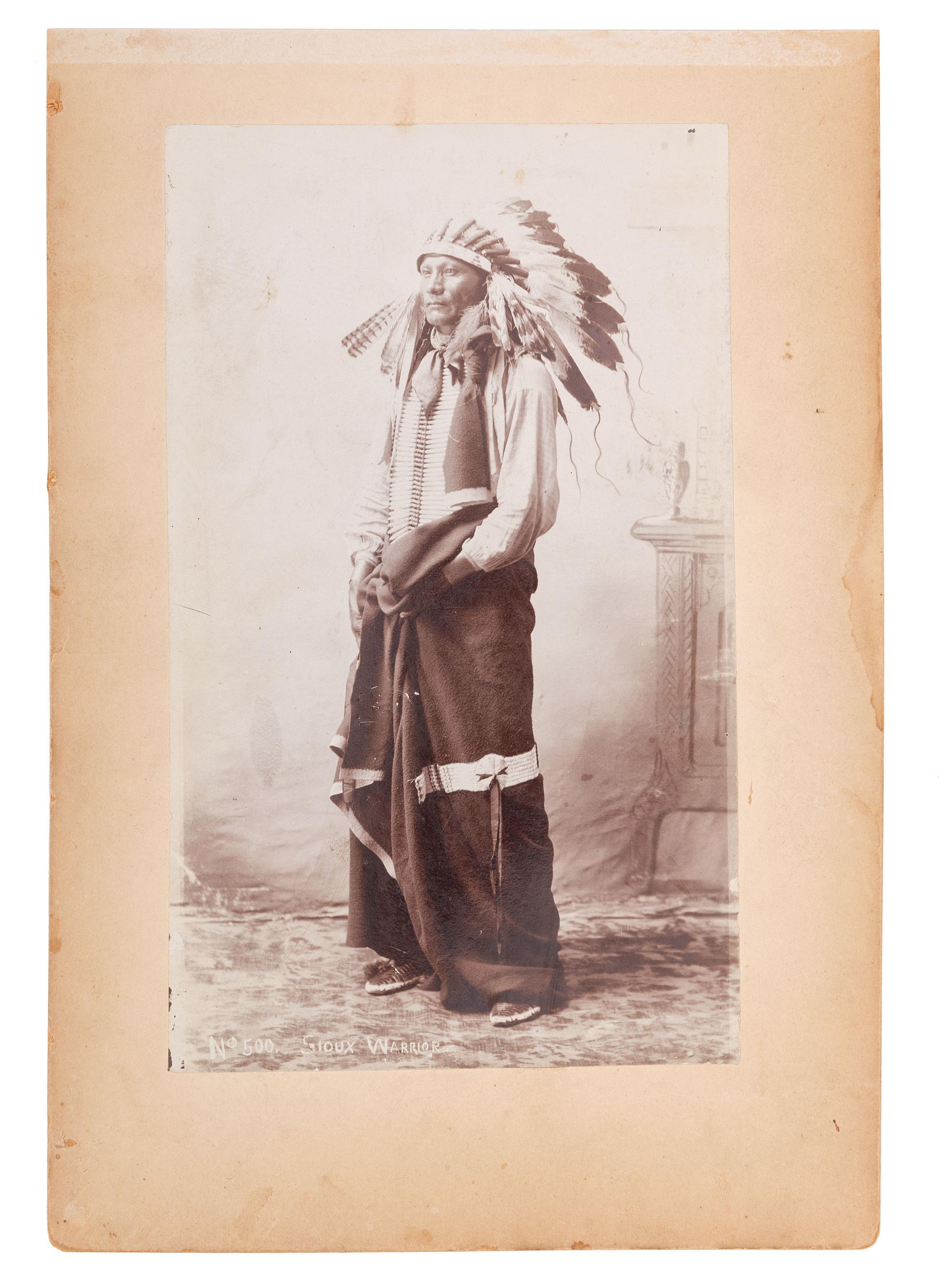 [NATIVE AMERICANS]. [ANDERSON, John A., photographer (1869-1948)]. Two photographs of Sioux Indians, incl. Two Strikes.