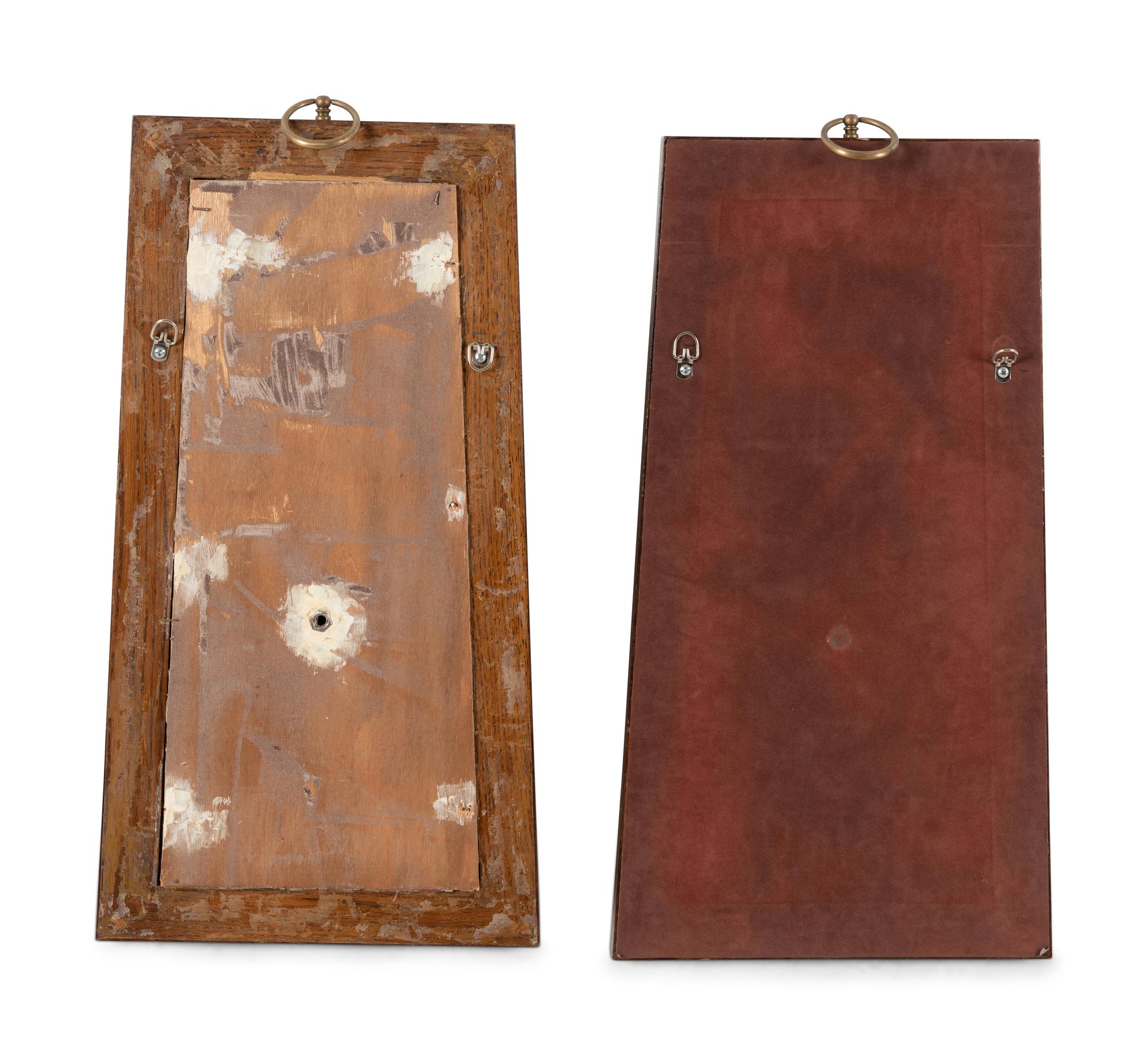 A Pair of Brass Mounted Suede-Inset Oak Mirrored Sconces