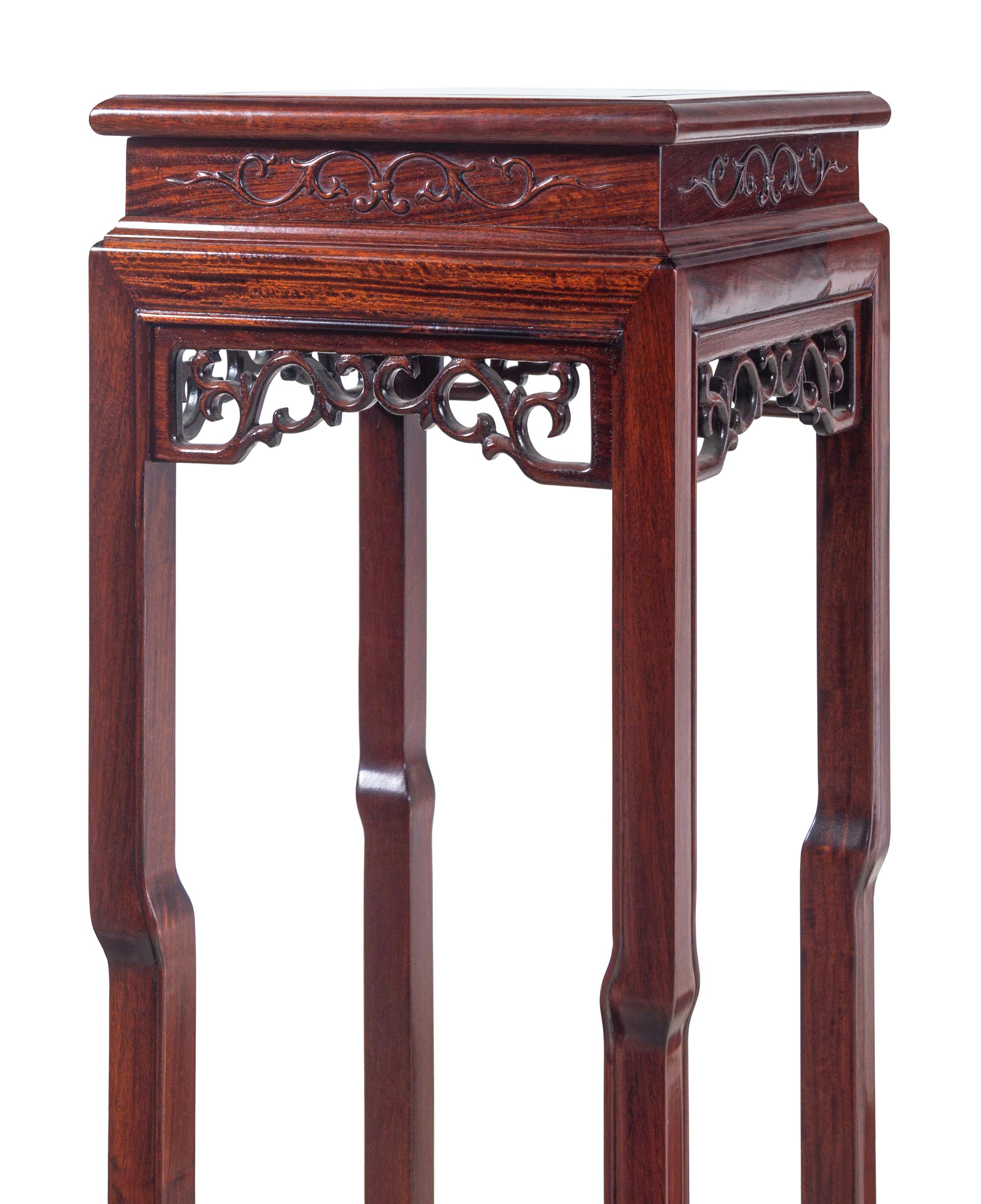A Pair of Chinese Carved Hardwood Stands