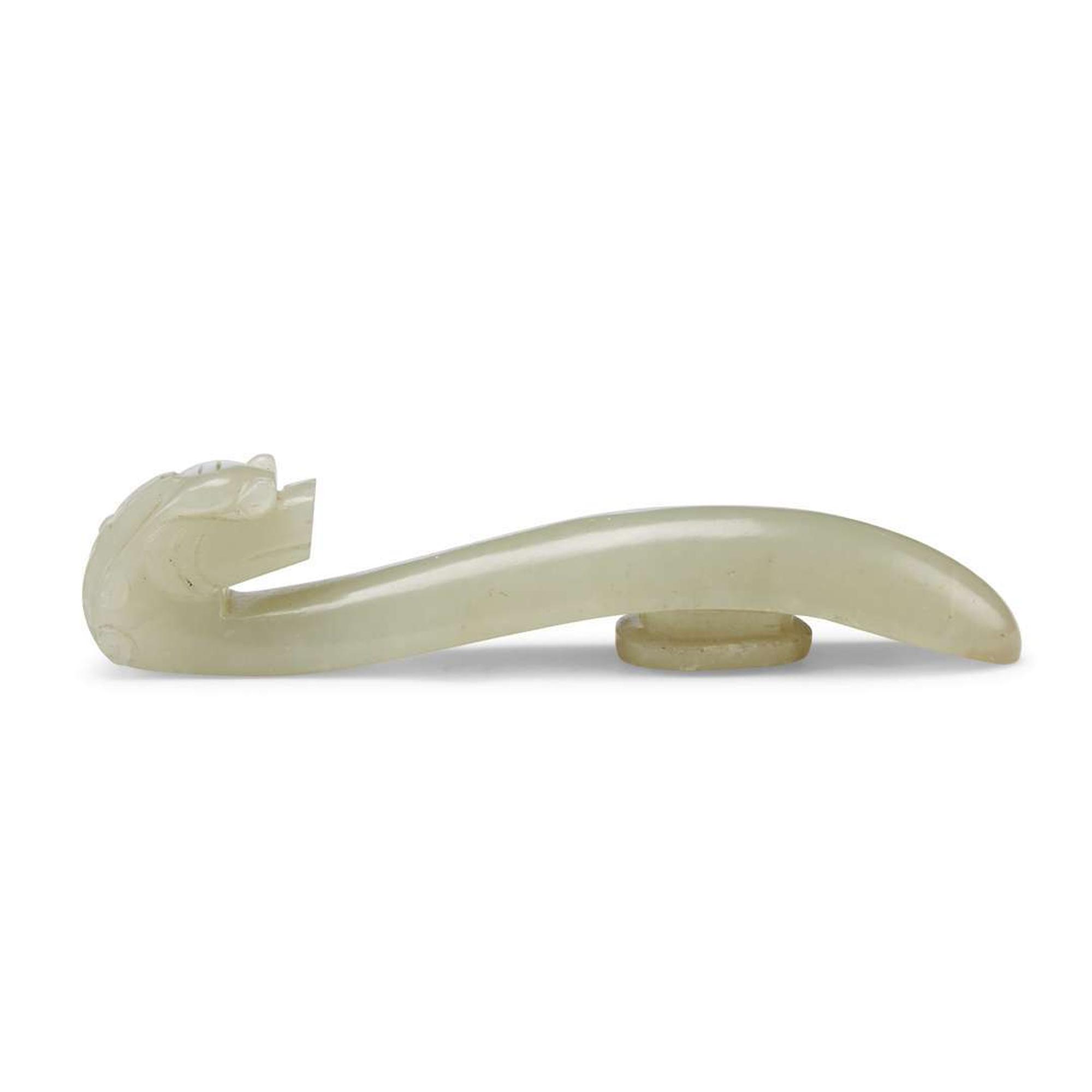 Four Pale Celadon Jade "Dragon" Belthooks, Qing Dynasty 清 青玉龍鉤四件