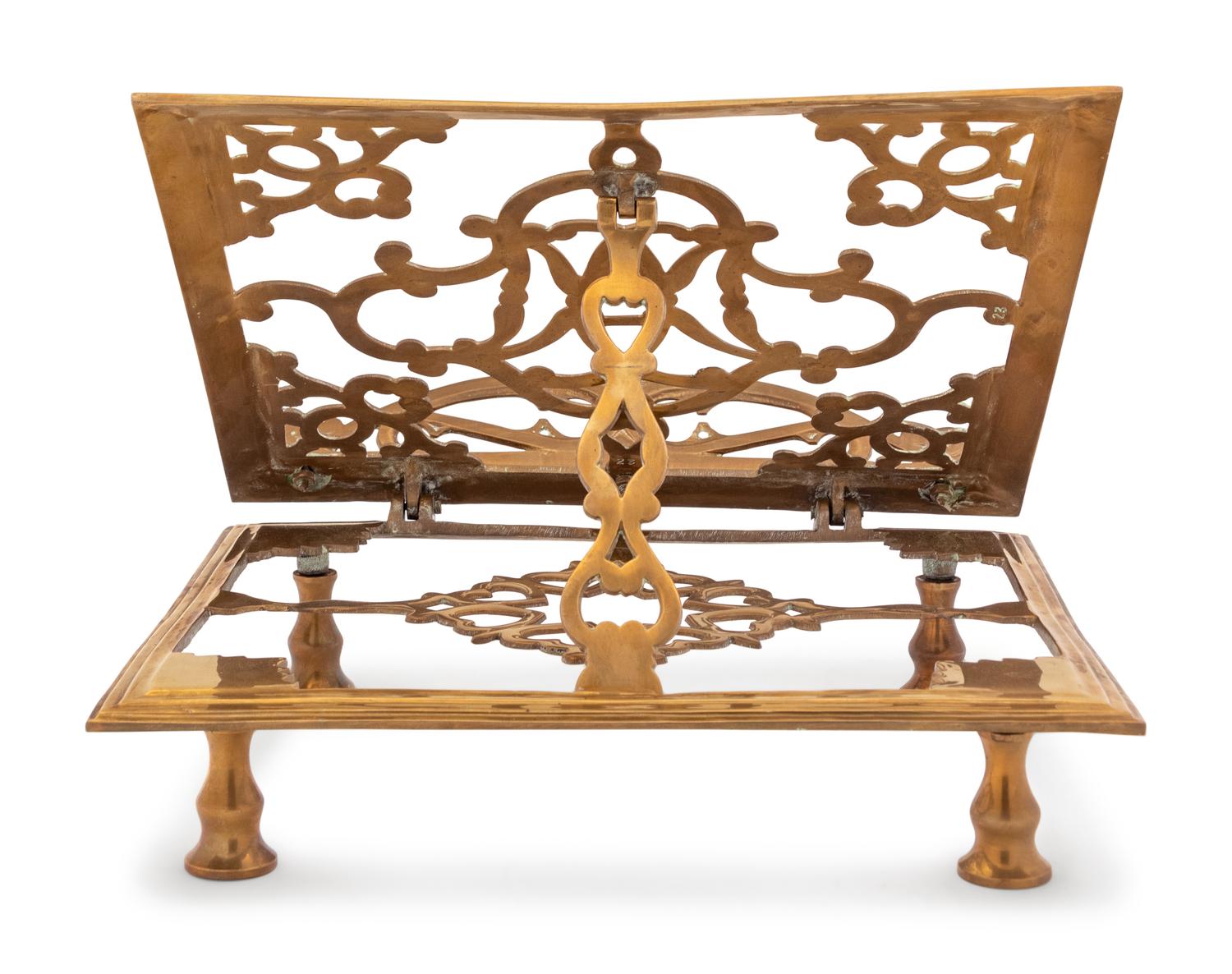 A Continental Brass Book Stand