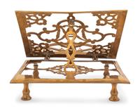 A Continental Brass Book Stand