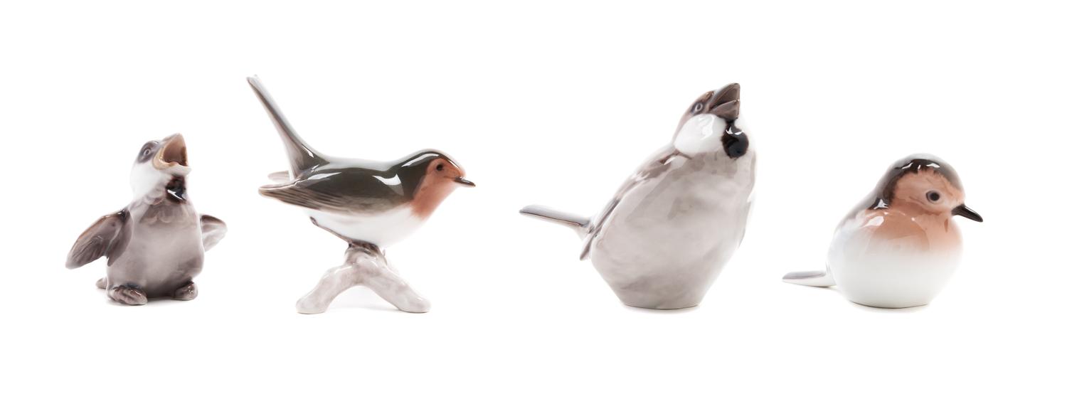 A Group of Bing and Grondahl Porcelain Birds Height of tallest 3 3/4 inches.