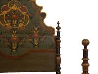 A Venetian Style Painted and Parcel Gilt Bed