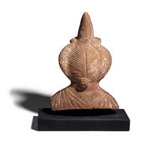 An Egyptian Terracotta Head of Harpocrates