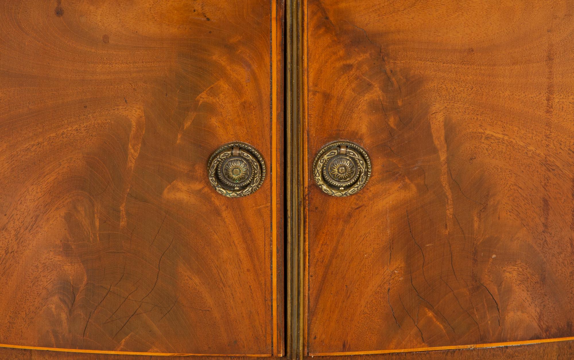 A Regency Style Mahogany Bow Front Side Cabinet