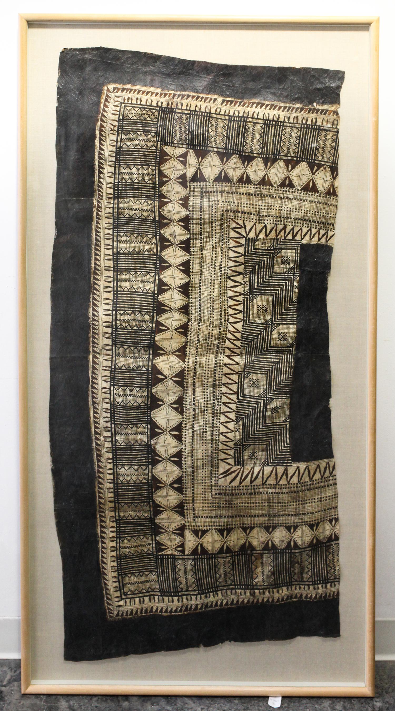 A Kuba Cloth Length 52 x width 24 1/2 inches.