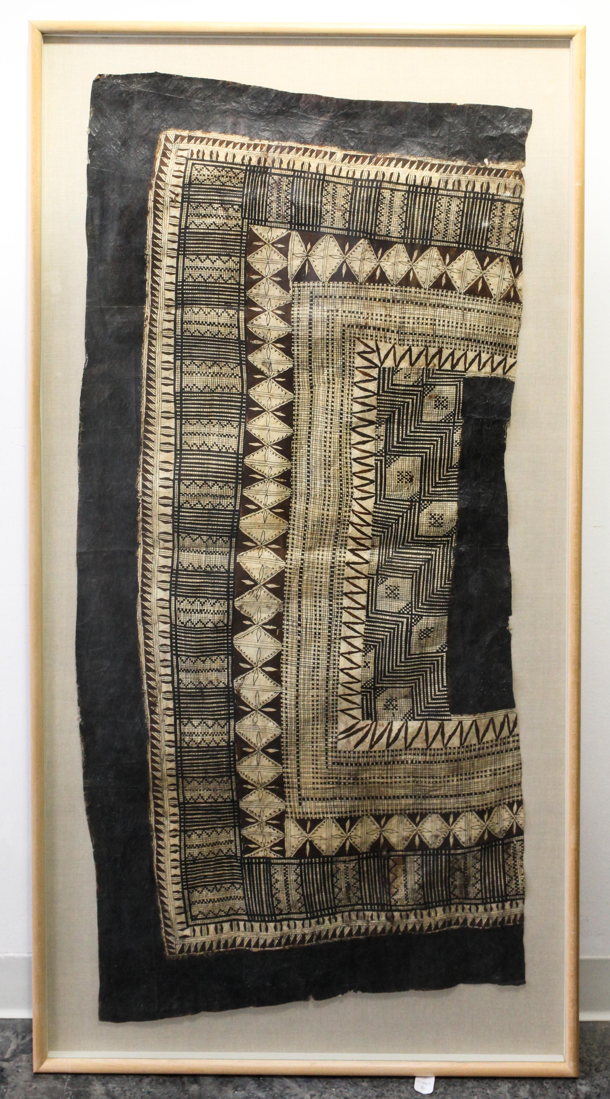 A Kuba Cloth Length 52 x width 24 1/2 inches.