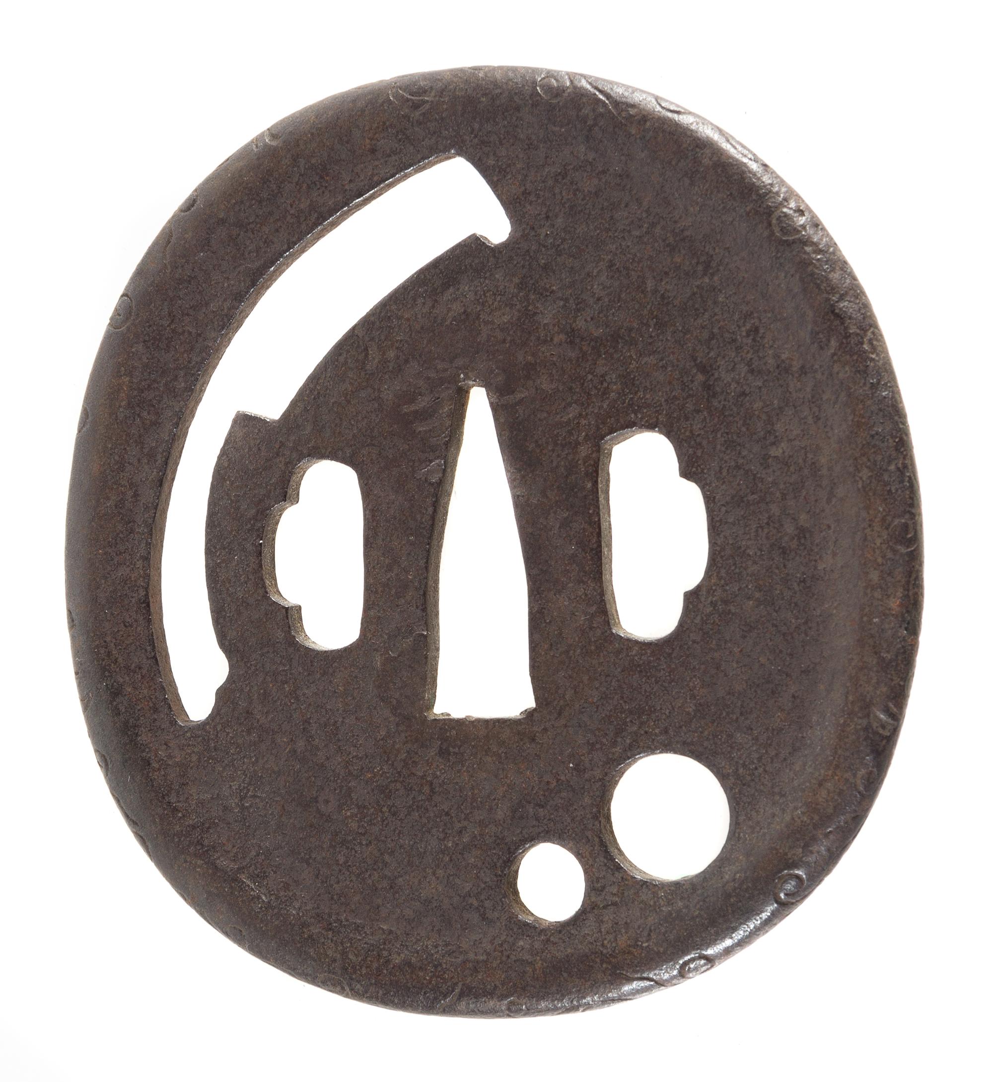 An Iron Tsuba Height 3 1/4 inches. — 17TH CENTURY