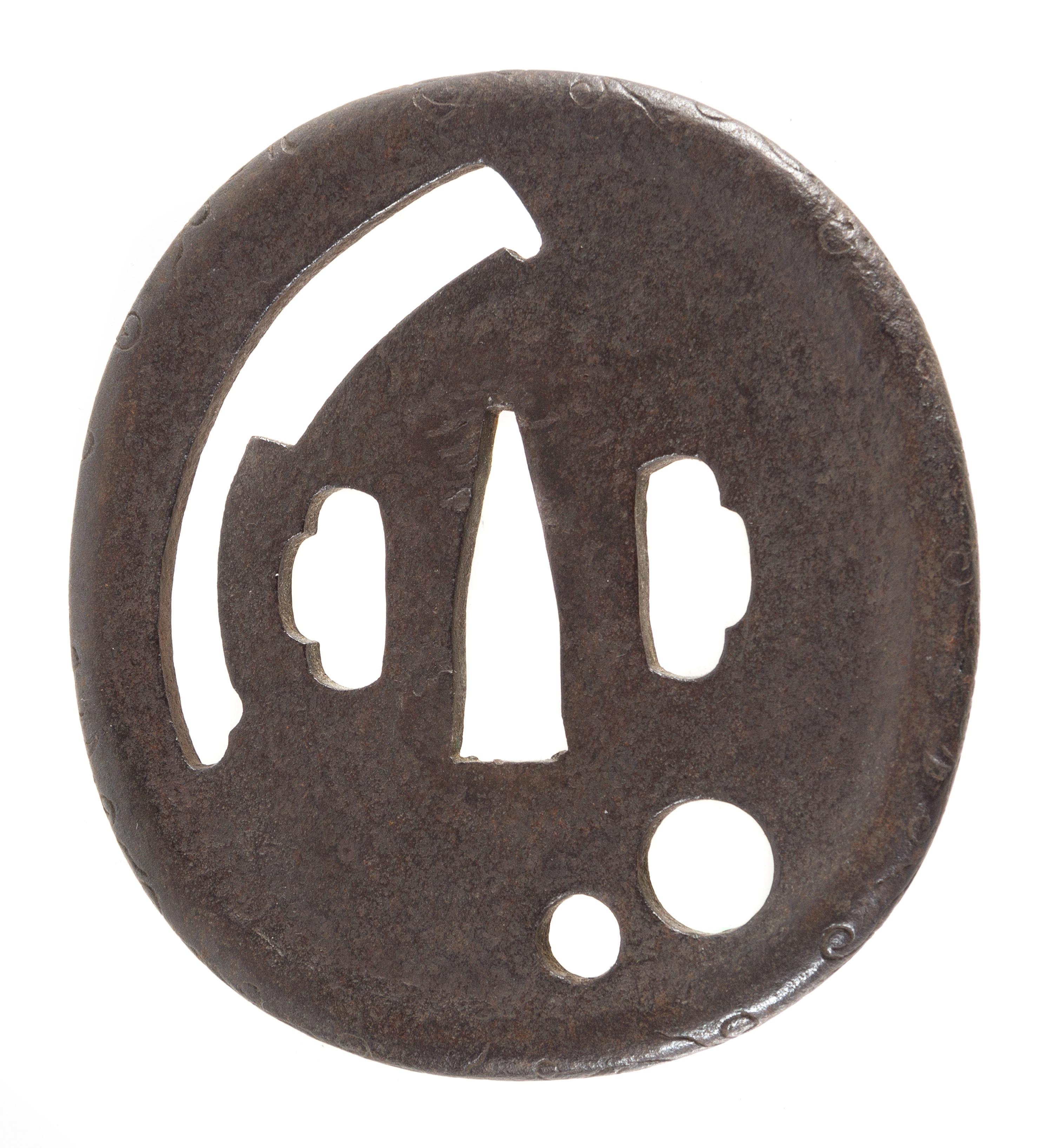 An Iron Tsuba Height 3 1/4 inches. — 17TH CENTURY